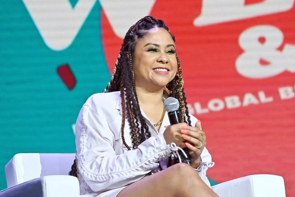 angela yee onstage at the 2022 essence festival